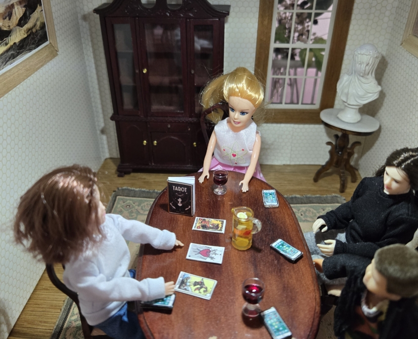 Tarot Card Reader: The Queen of Pentacles represents abundance and serenity. The fool is telling you to embrace the unknown. But the three of swords piercing a heart? That’s not good…